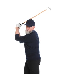 Senior man playing golf on white background