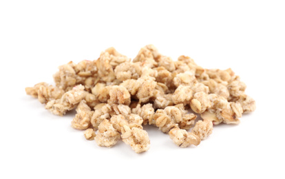 Image of Heap of tasty crispy granola on white background