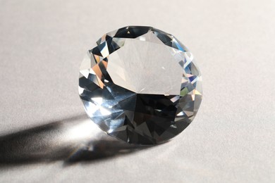 Big beautiful dazzling diamond on white background