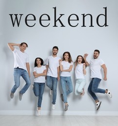 Image of Hello Weekend. Group of friends jumping near light wall