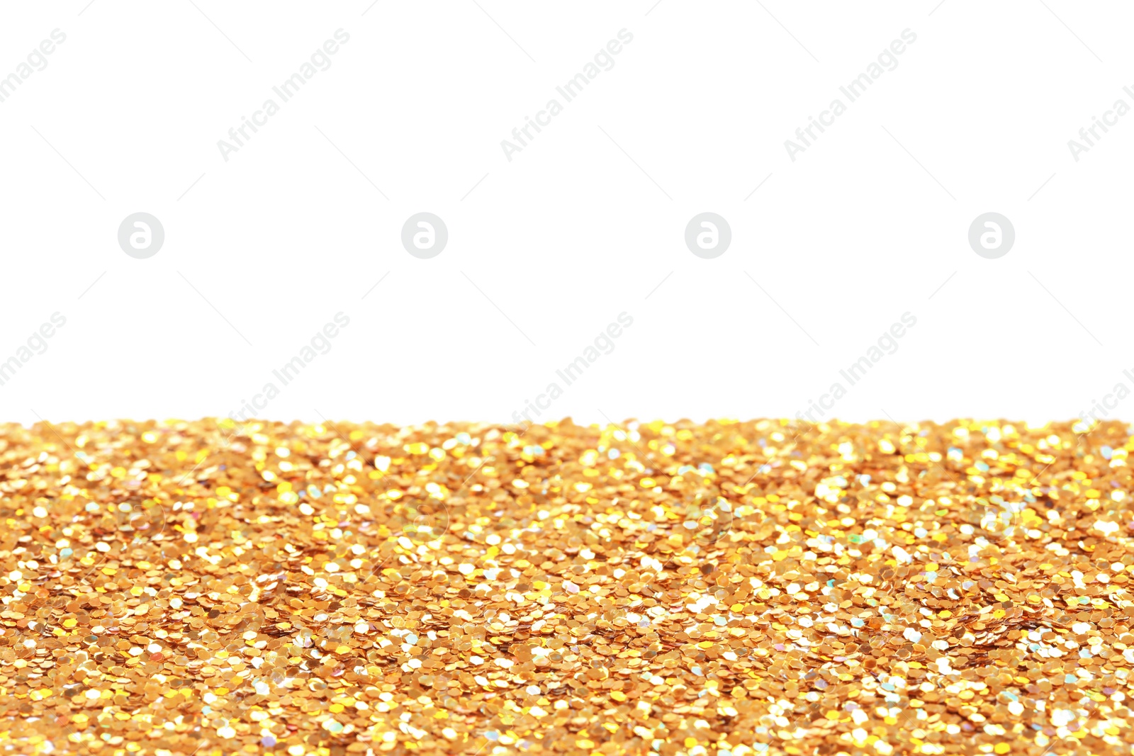 Photo of Many shiny golden paillettes against white background