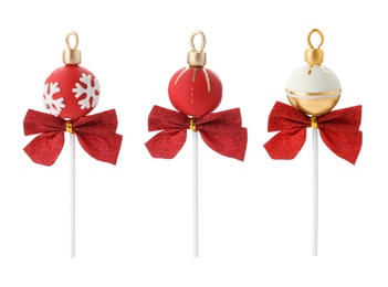 Image of Set of Christmas themed cake pops on white background