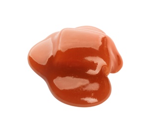 Photo of Caramel candy under tasty sauce isolated on white