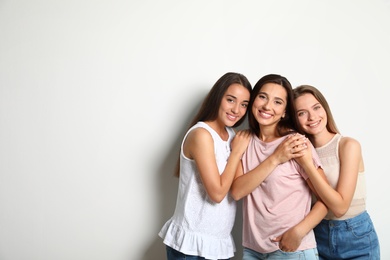 Photo of Happy women on white background, space for text. Girl power concept
