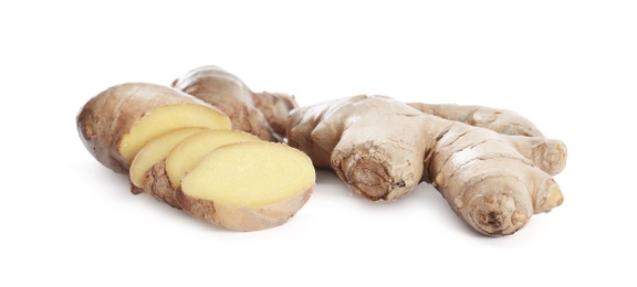 Photo of Cut fresh ginger root isolated on white