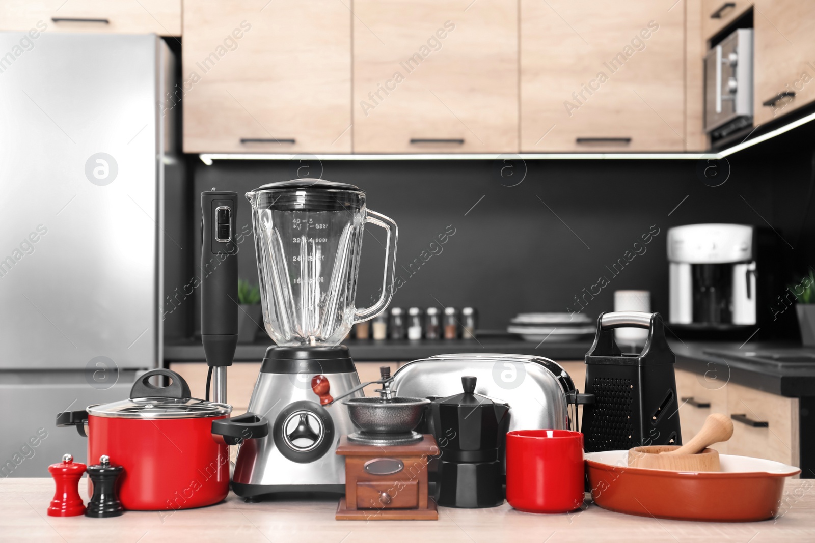 Photo of Set with modern domestic appliances in kitchen