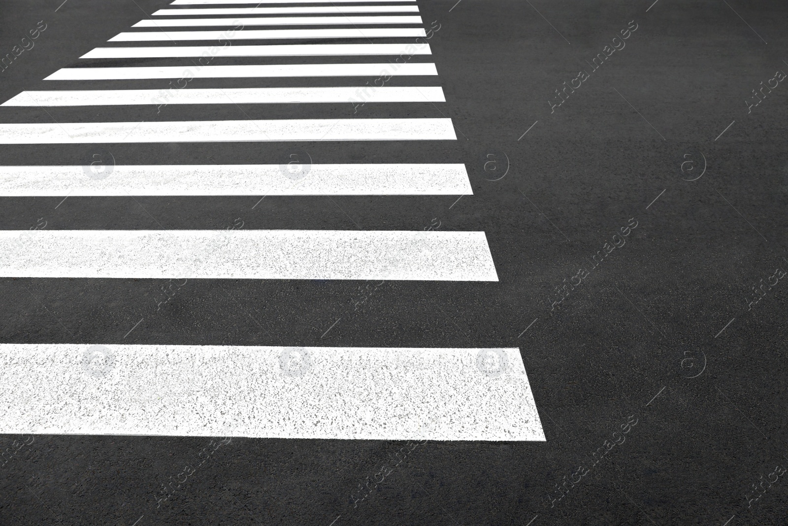 Photo of Pedestrian crossing on empty city street, closeup