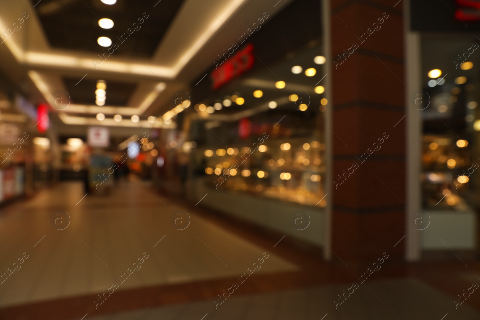 Photo of Blurred view of shopping mall interior. Bokeh effect