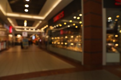 Blurred view of shopping mall interior. Bokeh effect