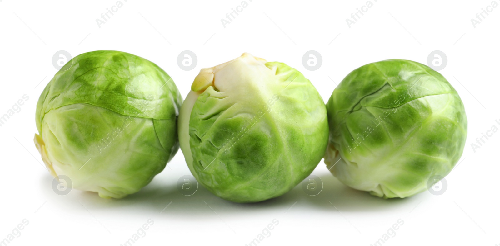 Photo of Fresh tasty Brussels sprouts on white background