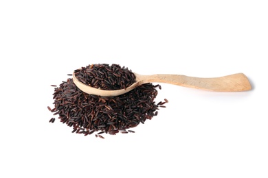 Photo of Spoon and uncooked black rice on white background