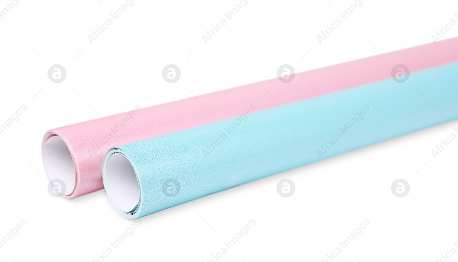 Photo of Rolls of colorful wrapping papers on white background