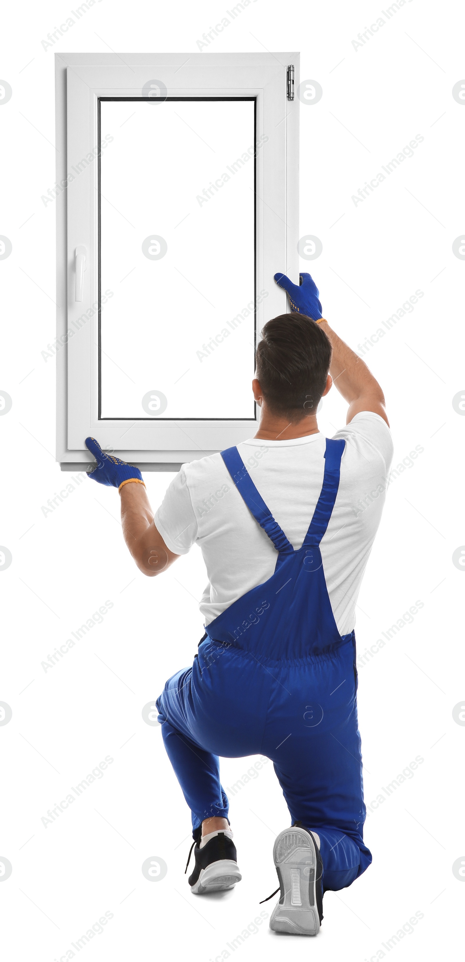 Photo of Worker with plastic window on white background, back view. Installation service