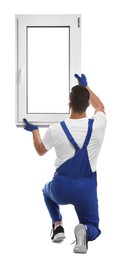 Worker with plastic window on white background, back view. Installation service