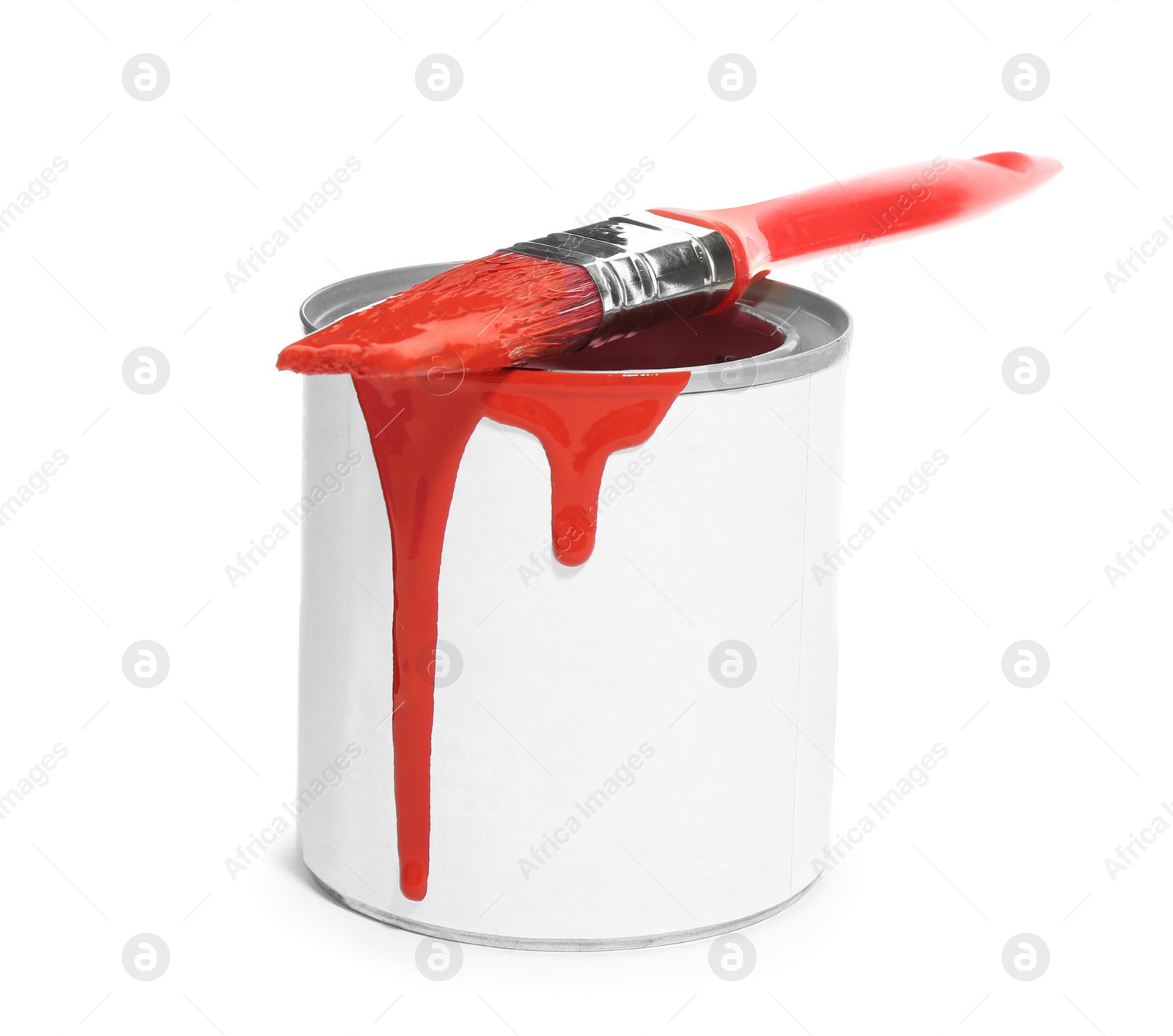 Photo of Can of red paint with brush on white background