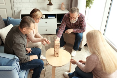 Photo of Happy senior couples spending time together at home