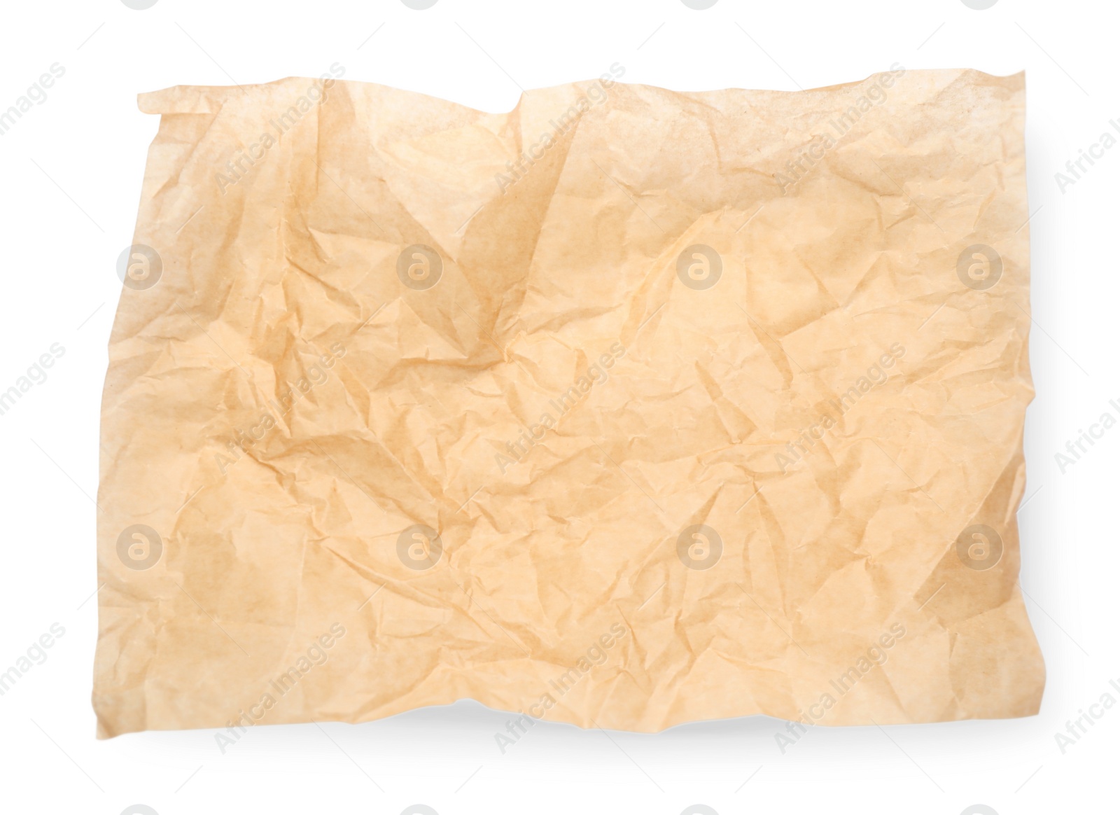 Photo of Sheet of crumpled brown baking paper on white background, top view