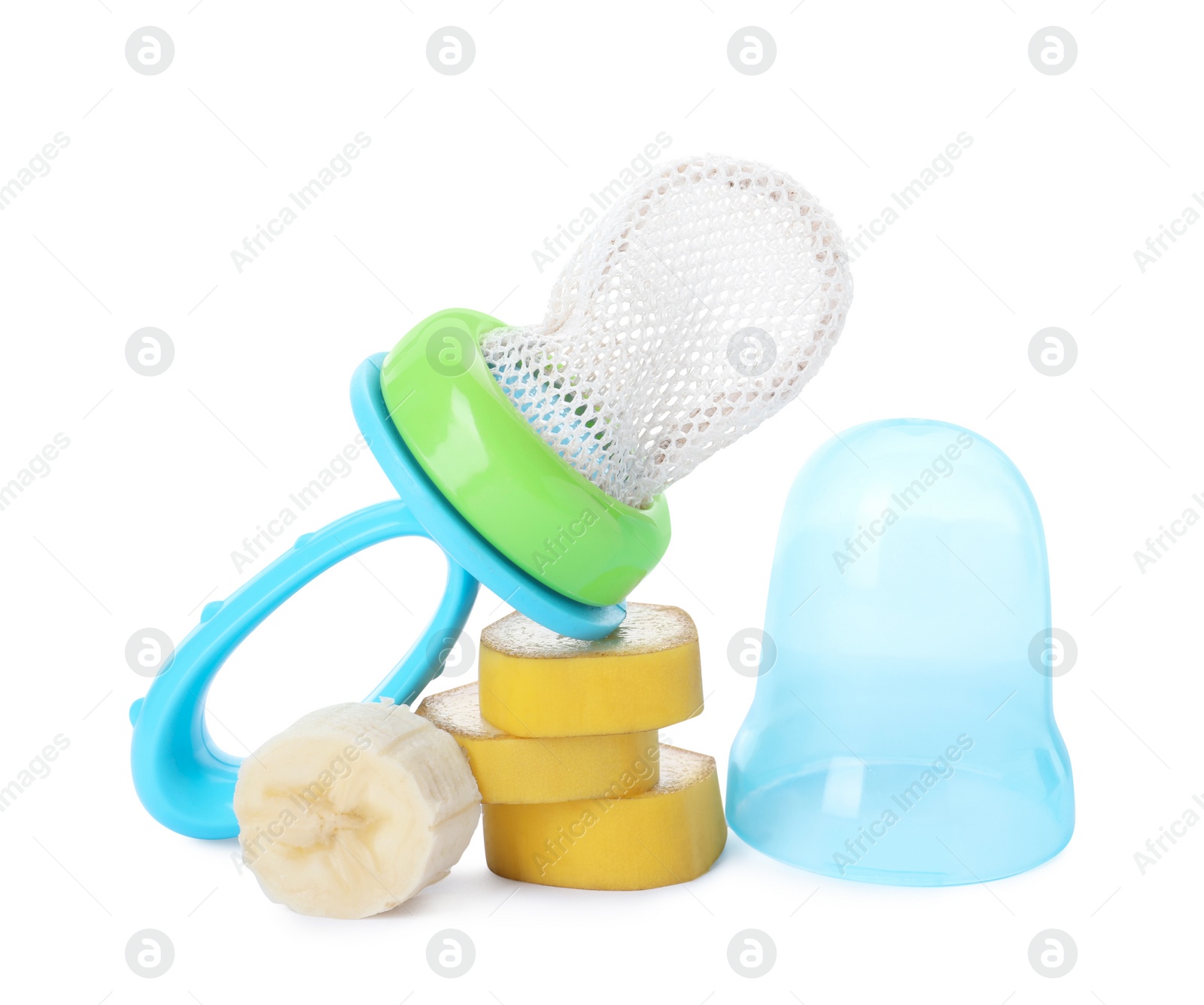 Photo of Empty nibbler and cut banana on white background. Baby feeder