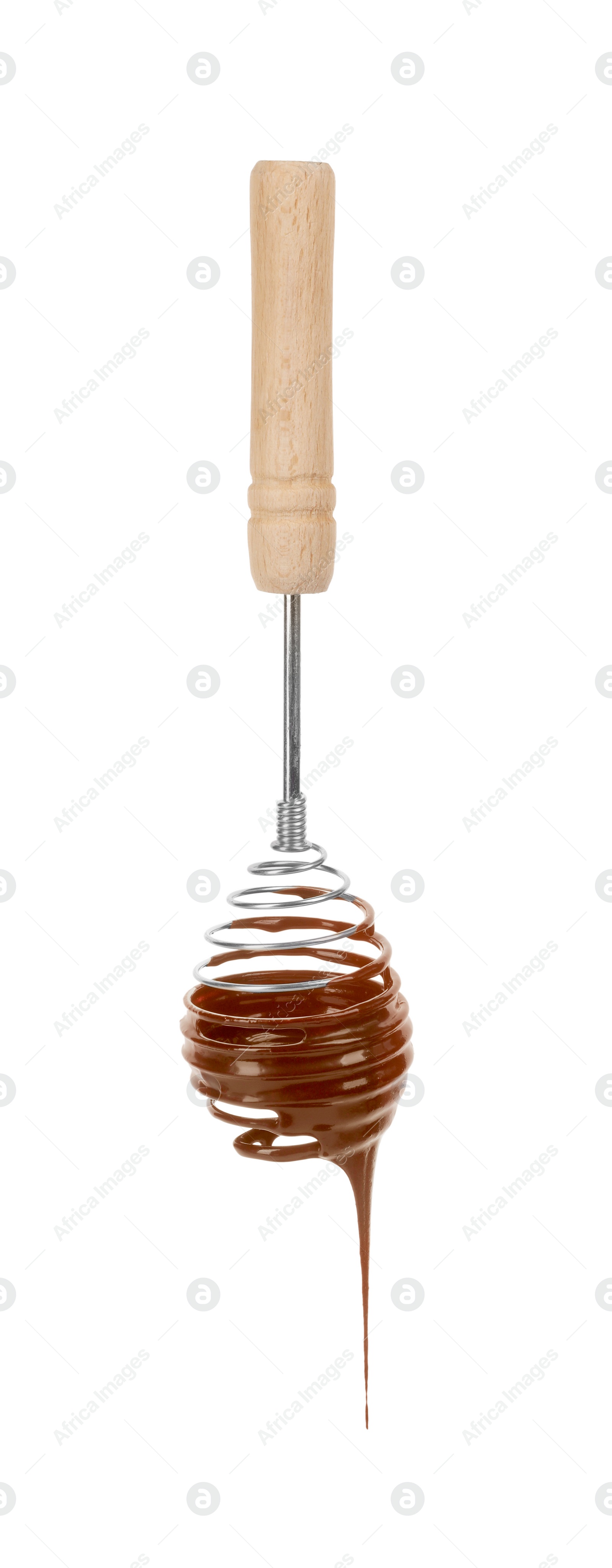 Photo of Chocolate cream flowing from whisk on white background