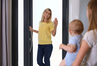 Mother leaving her baby with teen nanny at home