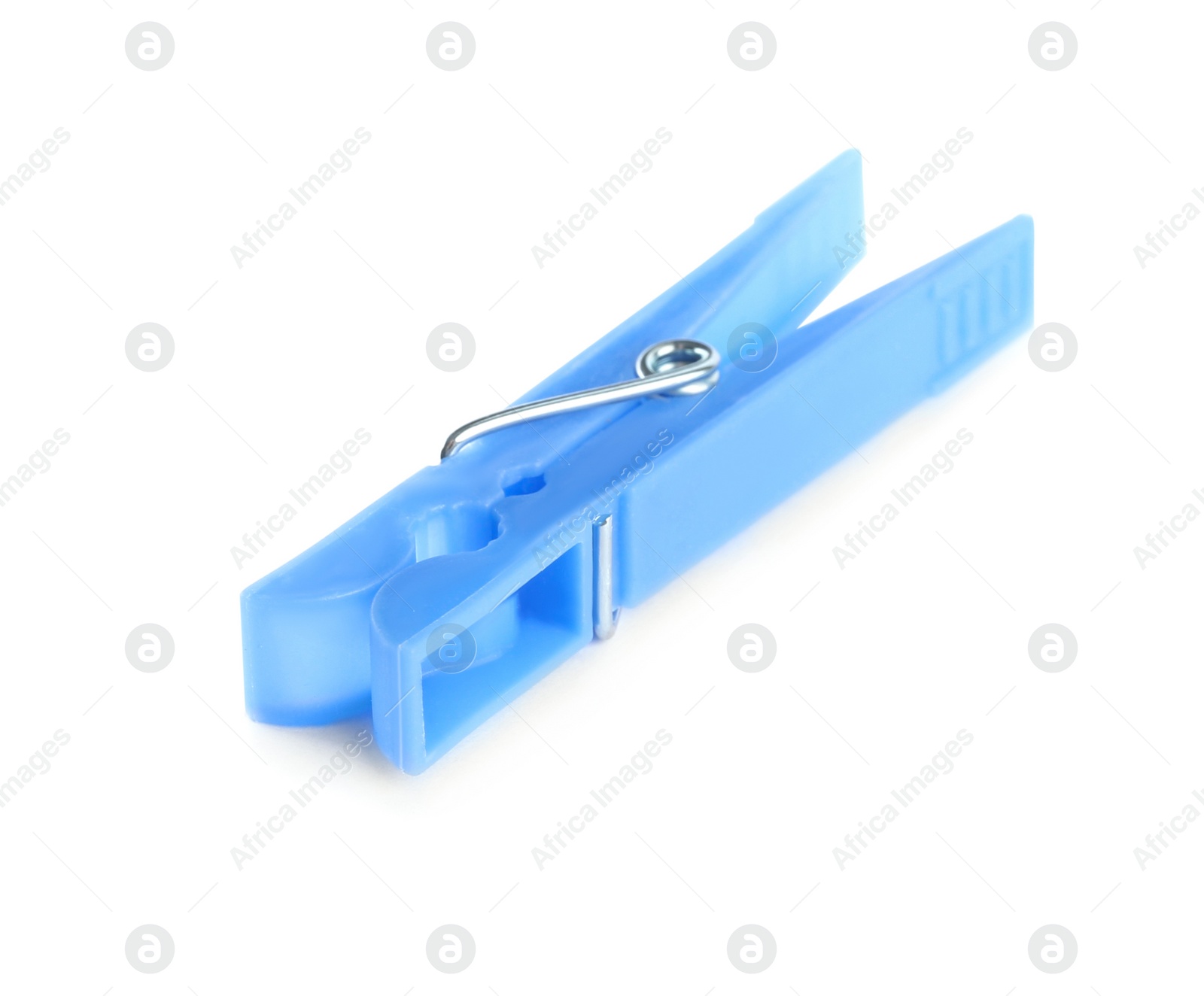 Photo of Bright light blue plastic clothespin isolated on white