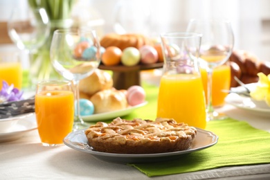 Festive Easter table setting with traditional meal at home