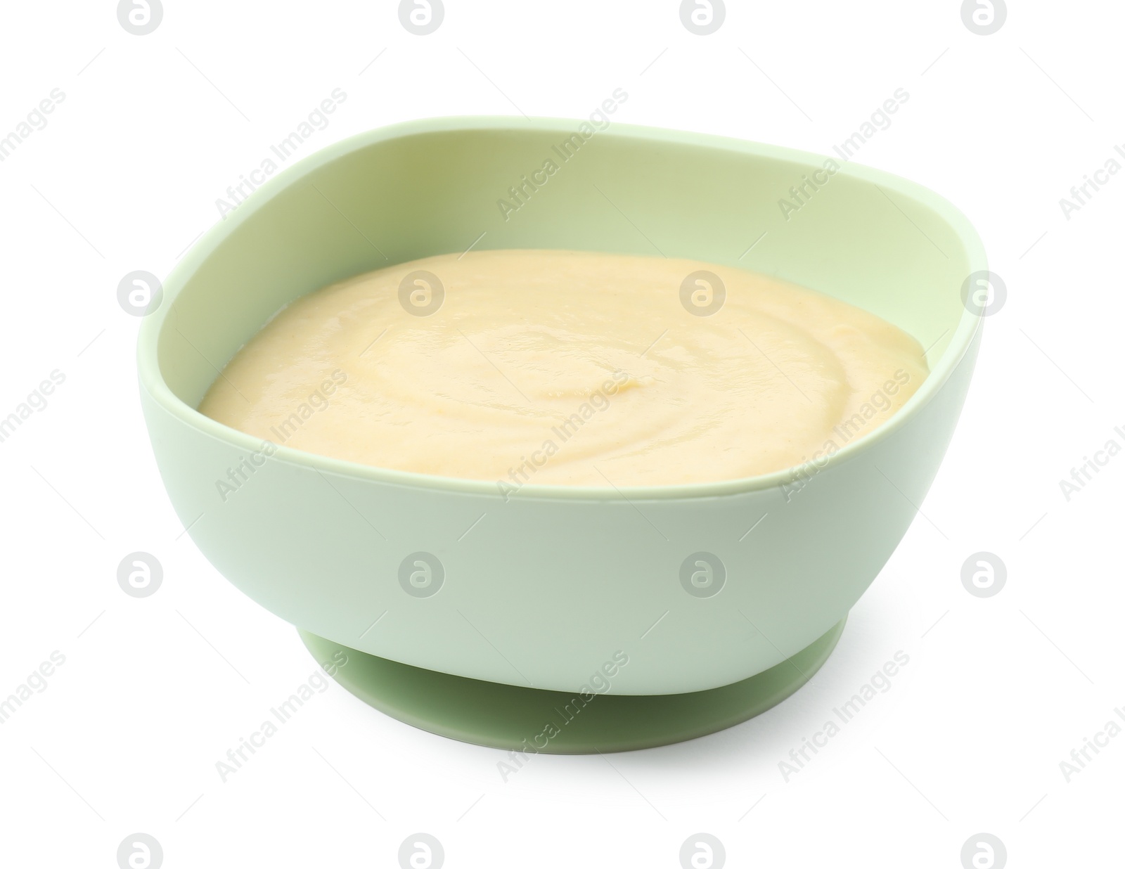 Photo of Tasty baby food in bowl isolated on white