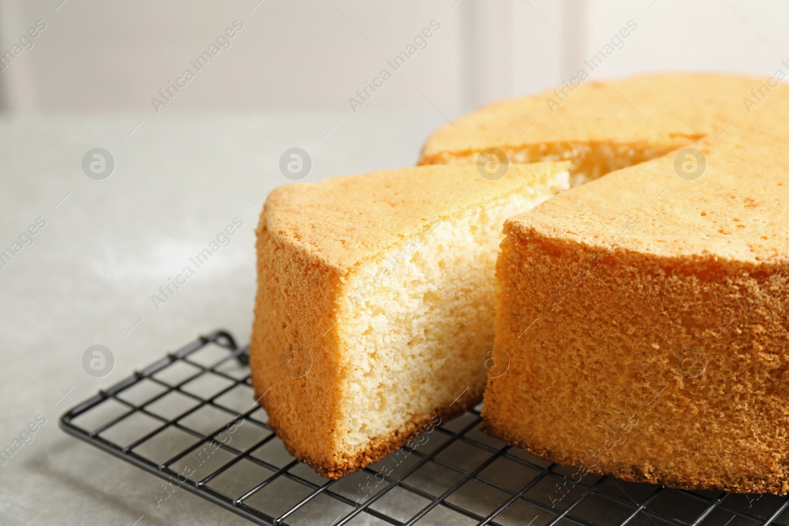 Photo of Delicious fresh homemade cake on grey table, closeup