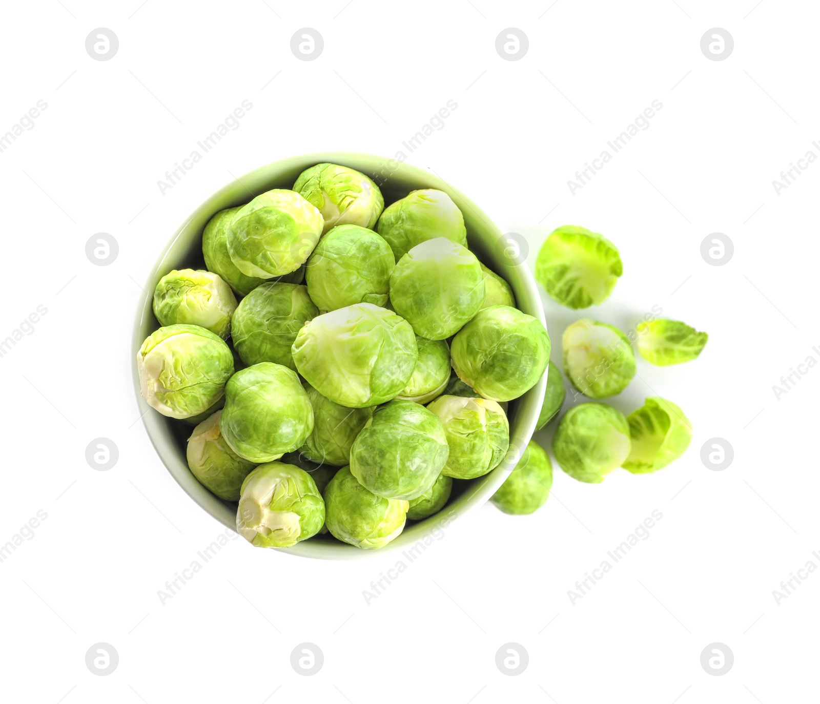 Photo of Bowl of fresh Brussels sprouts isolated on white, top view