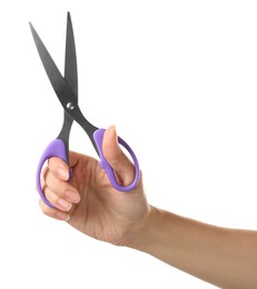Photo of Woman holding office scissors isolated on white, closeup