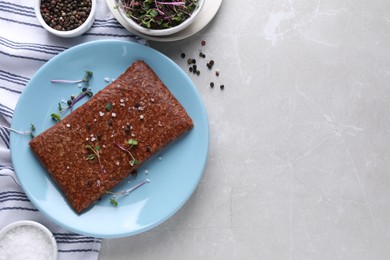 Fresh raw vegan mince with spices on light grey marble table, flat lay. Space for text