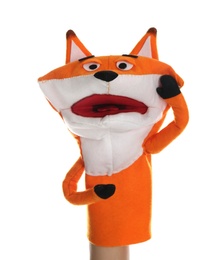 Photo of Fox puppet for show on hand against white background