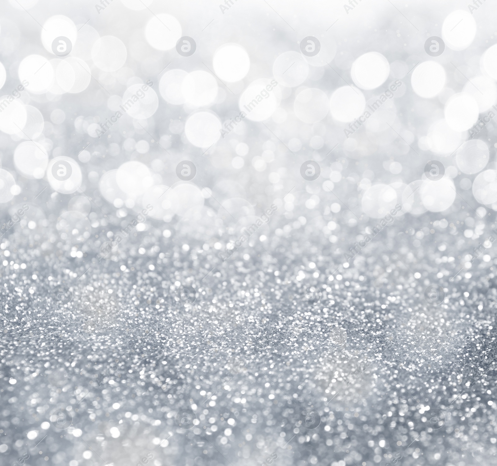 Image of Shiny silver glitter as background. Bokeh effect