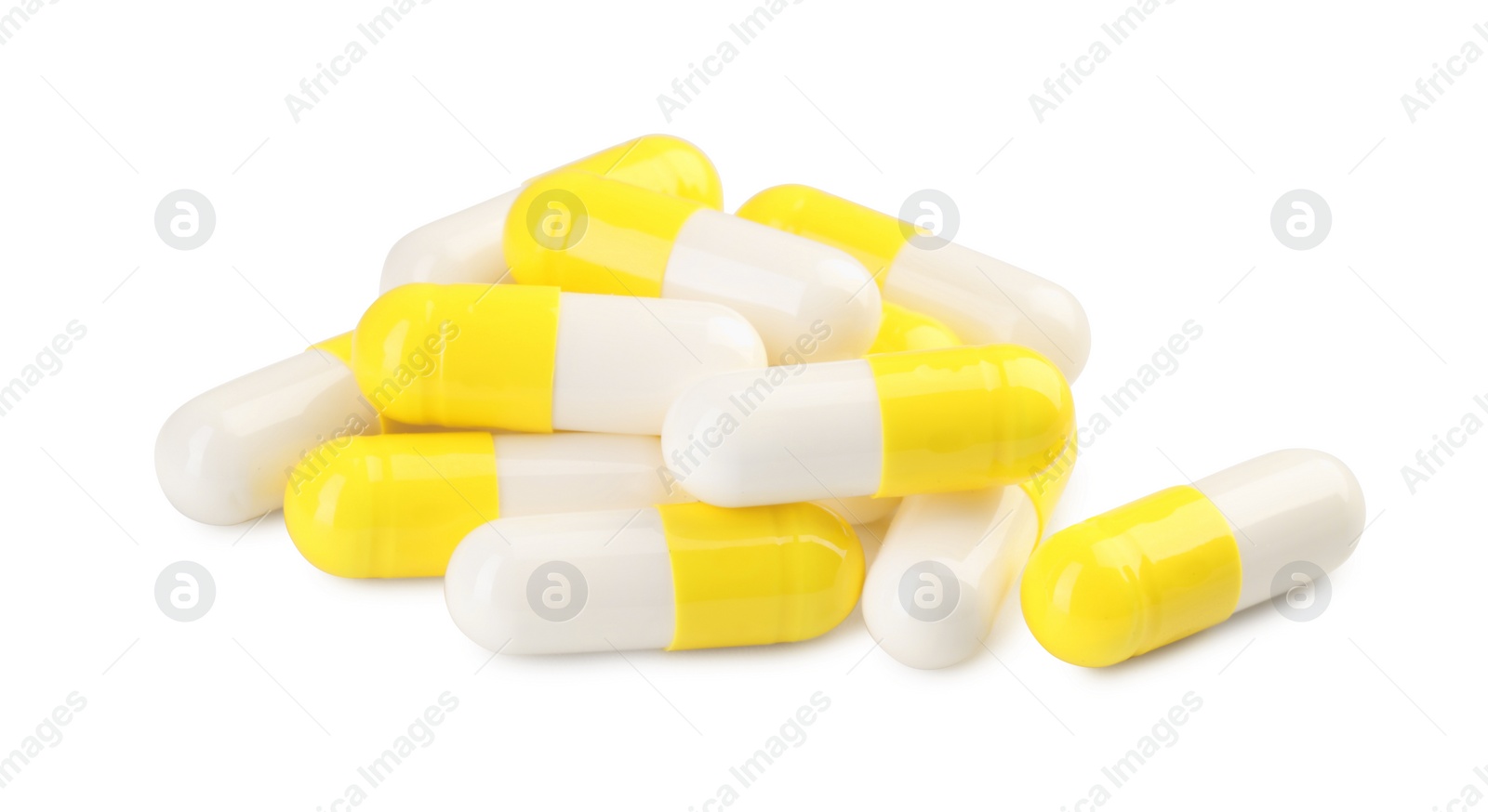 Photo of Many antibiotic pills isolated on white. Medicinal treatment