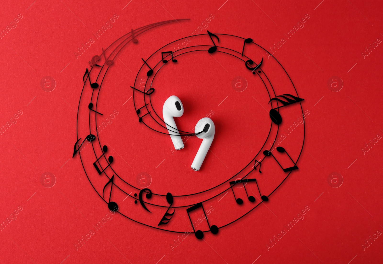 Image of Staff with music notes flowing from white wireless earphones on white background, top view