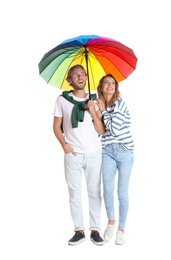 Photo of Couple with rainbow umbrella on white background