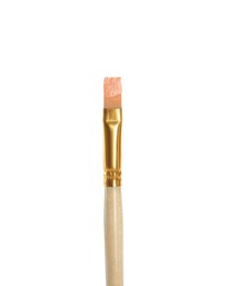 Photo of Brush with pink paint on white background