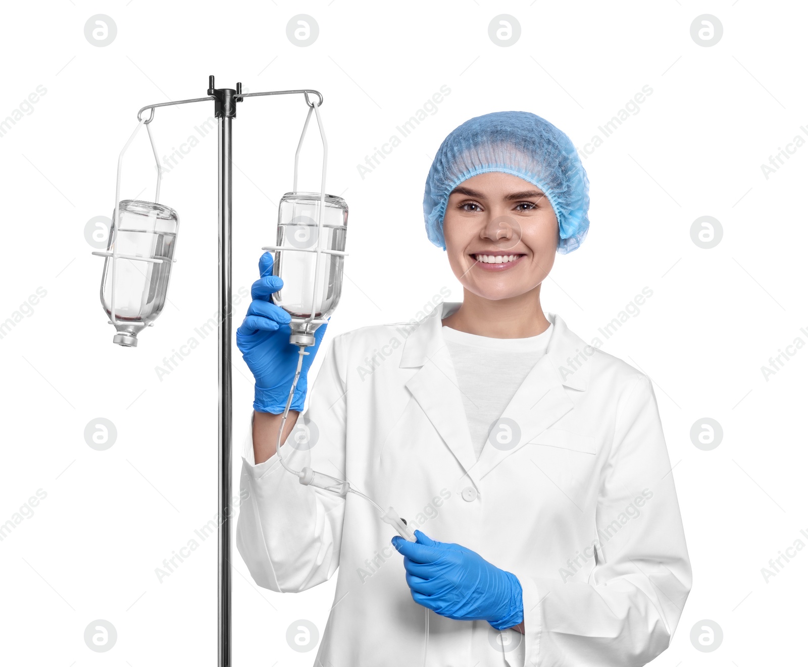 Photo of Nurse setting up IV drip on white background