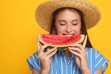 Photo of Beautiful girl with slice of watermelon on yellow background. Space for text