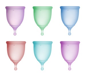 Image of Set with different menstrual cups on white background