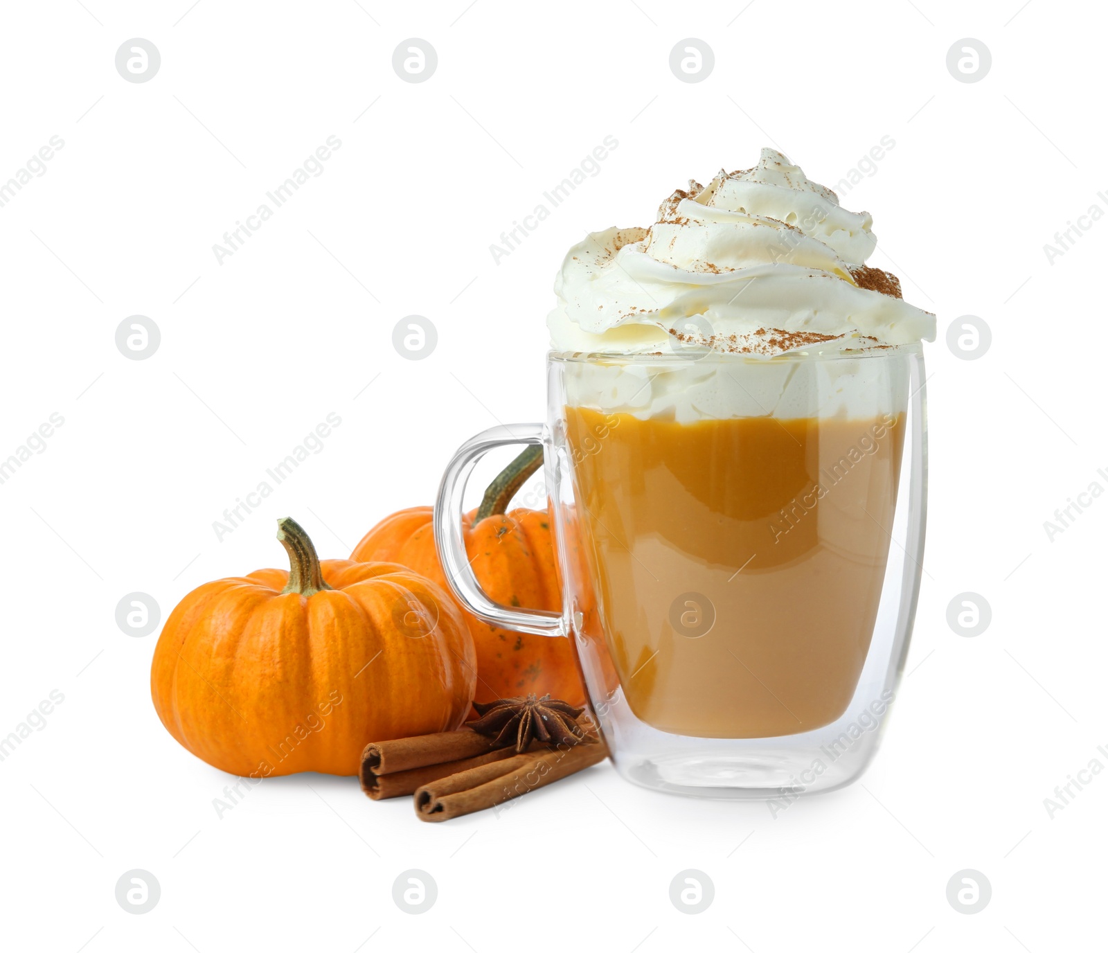 Photo of Cup of pumpkin spice latte with whipped cream, squashes and cinnamon sticks isolated on white