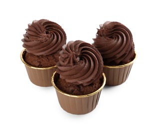 Photo of Three delicious chocolate cupcakes isolated on white