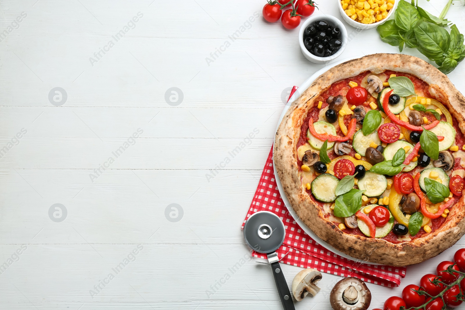 Photo of Flat lay composition with vegetable pizza on white wooden table. Space for text