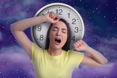 Young tired woman, clock and beautiful starry sky at night on background