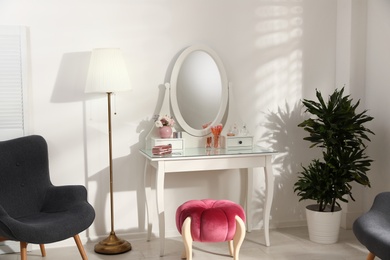 Photo of Stylish room interior with elegant dressing table