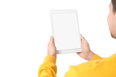 Man holding tablet with blank screen on white background, closeup. Mockup for design