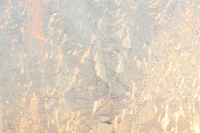 Photo of Beautiful frosty window as background, closeup. Winter morning