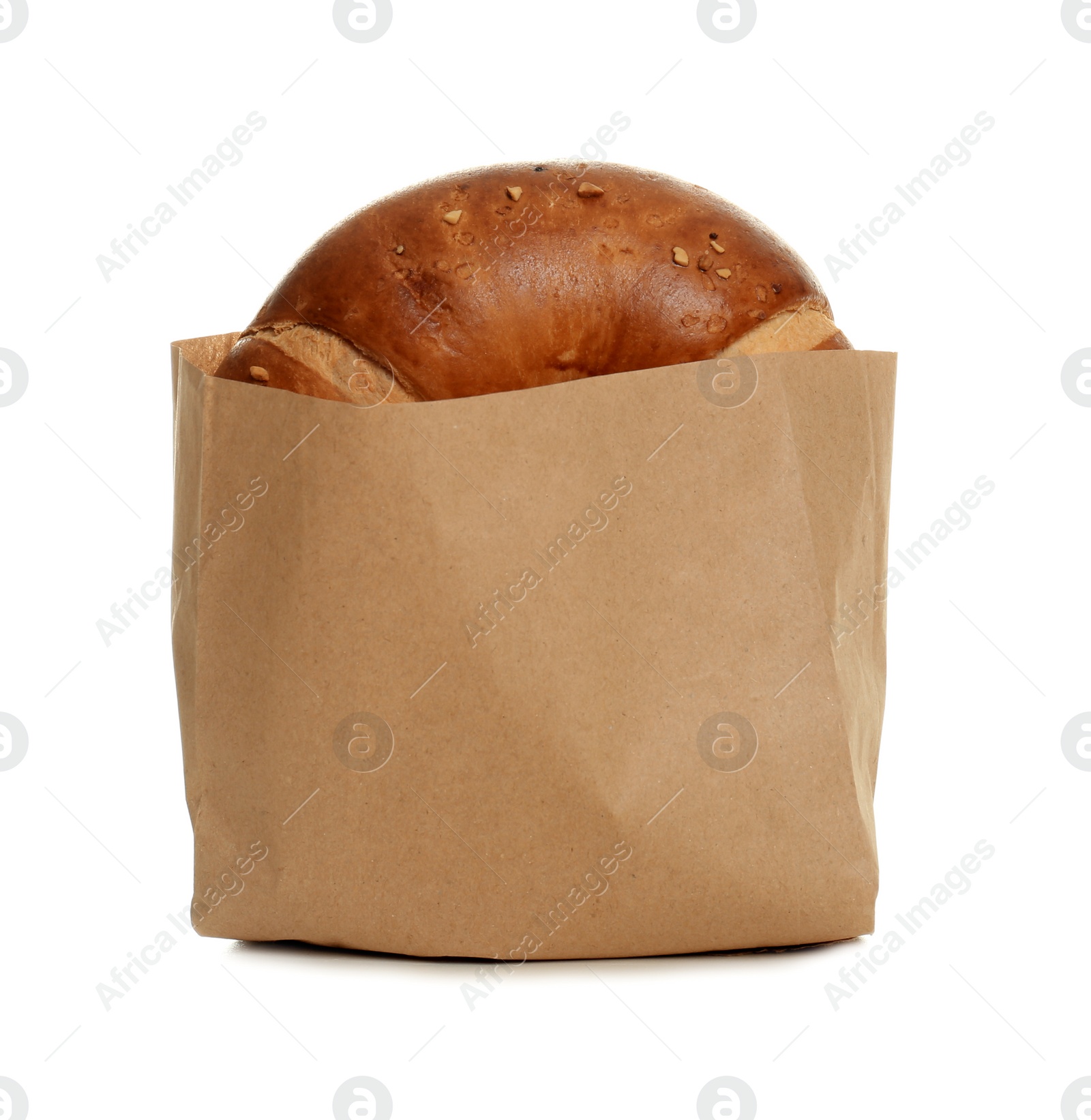 Photo of Paper bag with bun on white background. Space for design