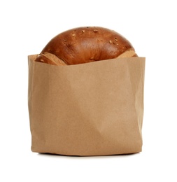 Photo of Paper bag with bun on white background. Space for design