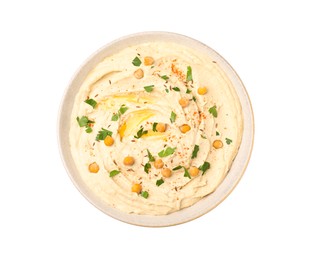 Photo of Tasty hummus with garnish in bowl isolated on white, top view